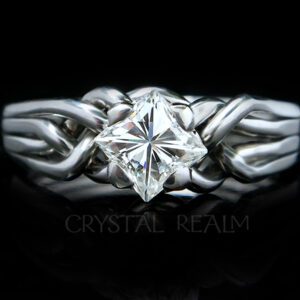 four band puzzle ring with princess diamond in platinum
