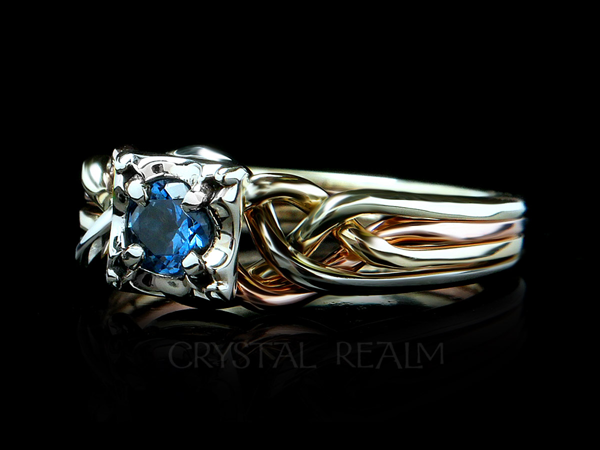 Guinevere four piece puzzle ring with round lab created blue zircon