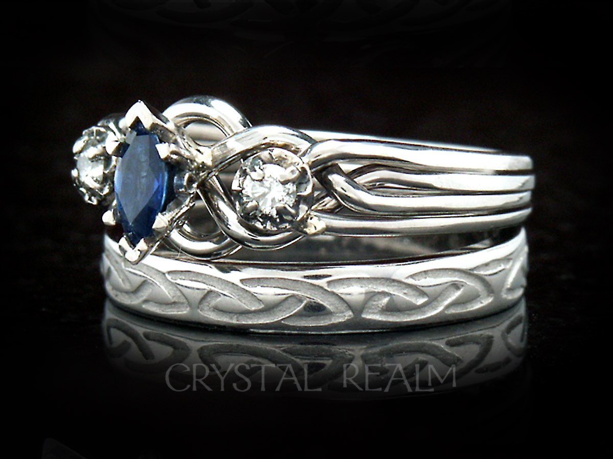 Four band puzzle ring with center sapphire, accent diamonds, and Celtic knot wedding ring