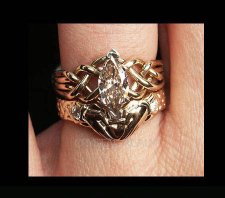 Marquise diamond puzzle ring with one carat diamond and claddagh shadow band set with two 6-point round diamonds