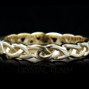 Celtic wedding ring in open eternity knot style and 14k yellow gold
