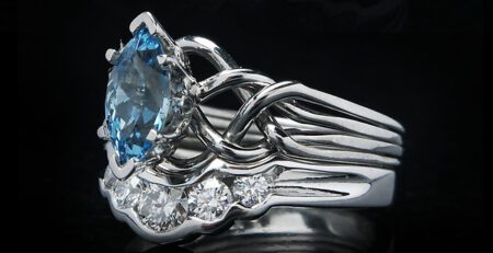 Celtic marquise aquamarine puzzle engagement ring with diamond shadow band