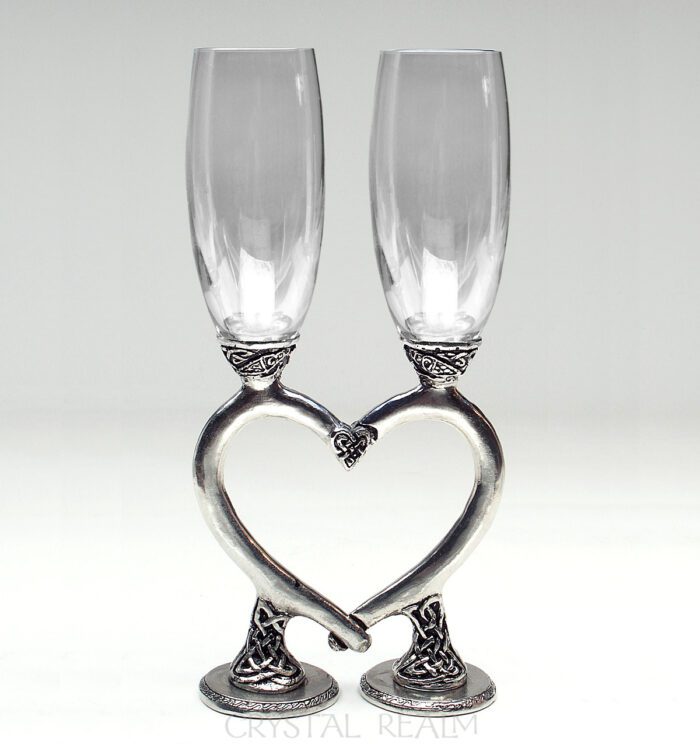 https://crystalrealm.com/wp-content/uploads/clear-smooth-celtic-heart-champagne-glasses-ko08-700x744.jpg