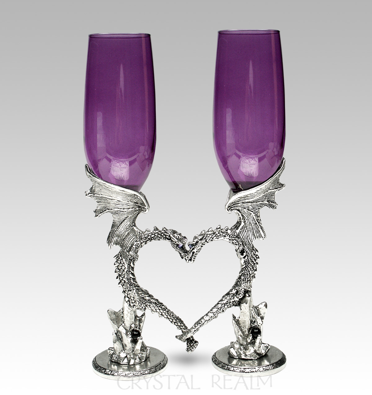Purple toasting glasses with dragon heart stems