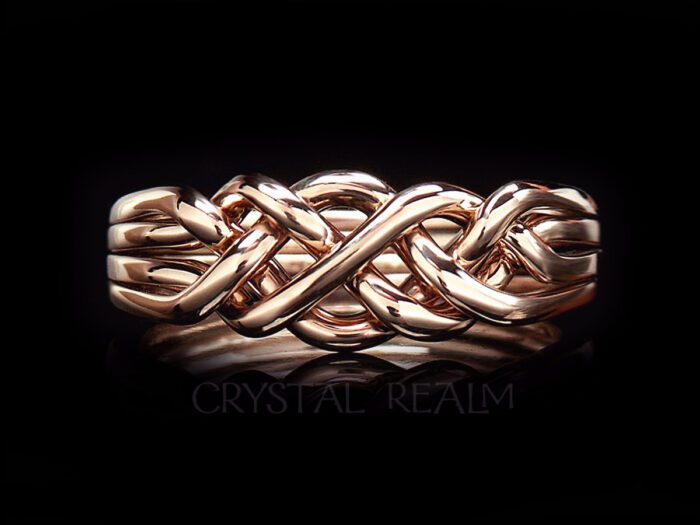 Four band puzzle ring in 14K rose gold and medium-heavy weight