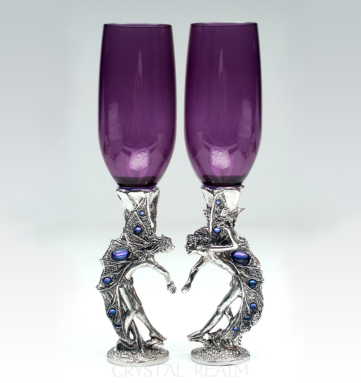 Girl-boy purple champagne flutes with fairies in a heart shape