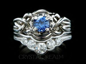Guinevere sapphire puzzle ring with diamond shadow band