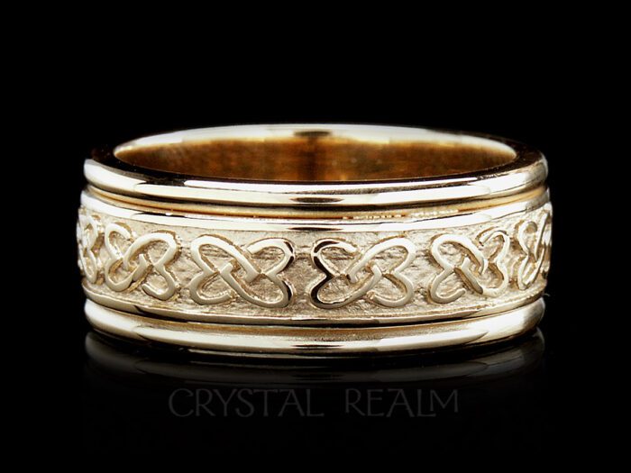 Handmade irish celtic wedding ring with double love knots and trim all in 14k yellow gold
