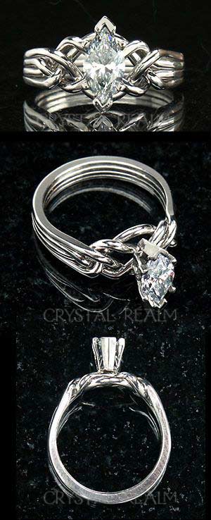 Four band puzzle ring with 0.72ct marquise diamond 