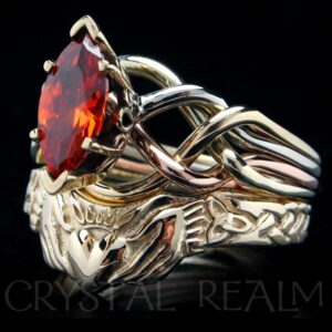 Celtic bridal set with one carat orange zircon marquise puzzle ring and claddagh band