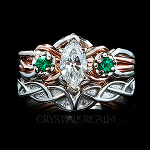 engagement ring with marquise diamond and accent tsavorite garnets with a celtic knotwork wedding band