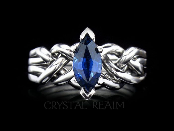 Marquise sapphire four band puzzle ring