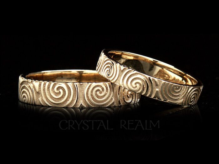 irish wedding rings in 14k yellow gold with celtic spiral design