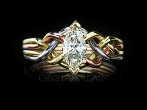 One-half carat marquise diamond engagement puzzle ring in four colors of 14K gold with open weave