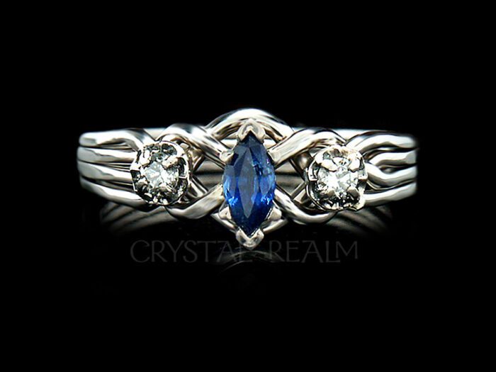4 piece puzzle engagement ring with marquise sapphire and two sparkling round accent diamonds
