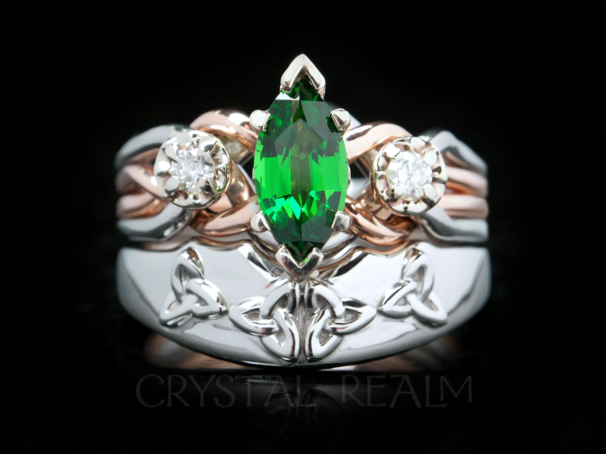 Tsavorite garnet and diamond engagement puzzle ring and Celtic trinity knot shadow band