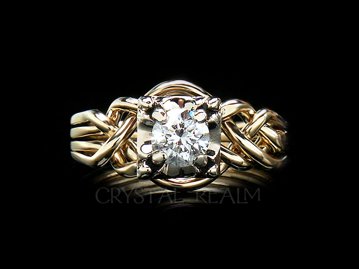 four band puzzle ring with round diamond and bands of 14k yellow gold with 14k white gold illusion setting