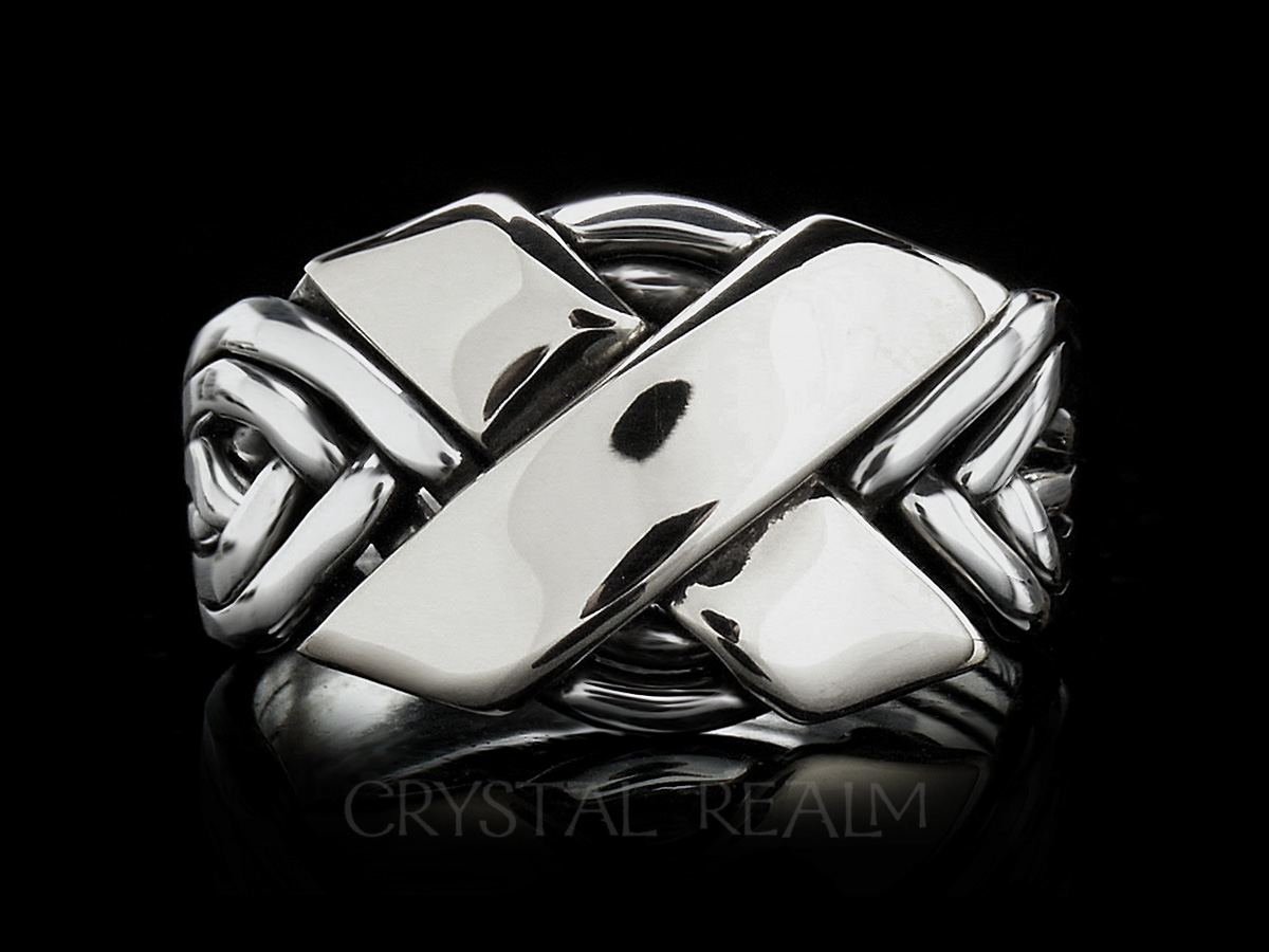 Six band puzzle ring in sterling silver with a wide cross in 14k white gold