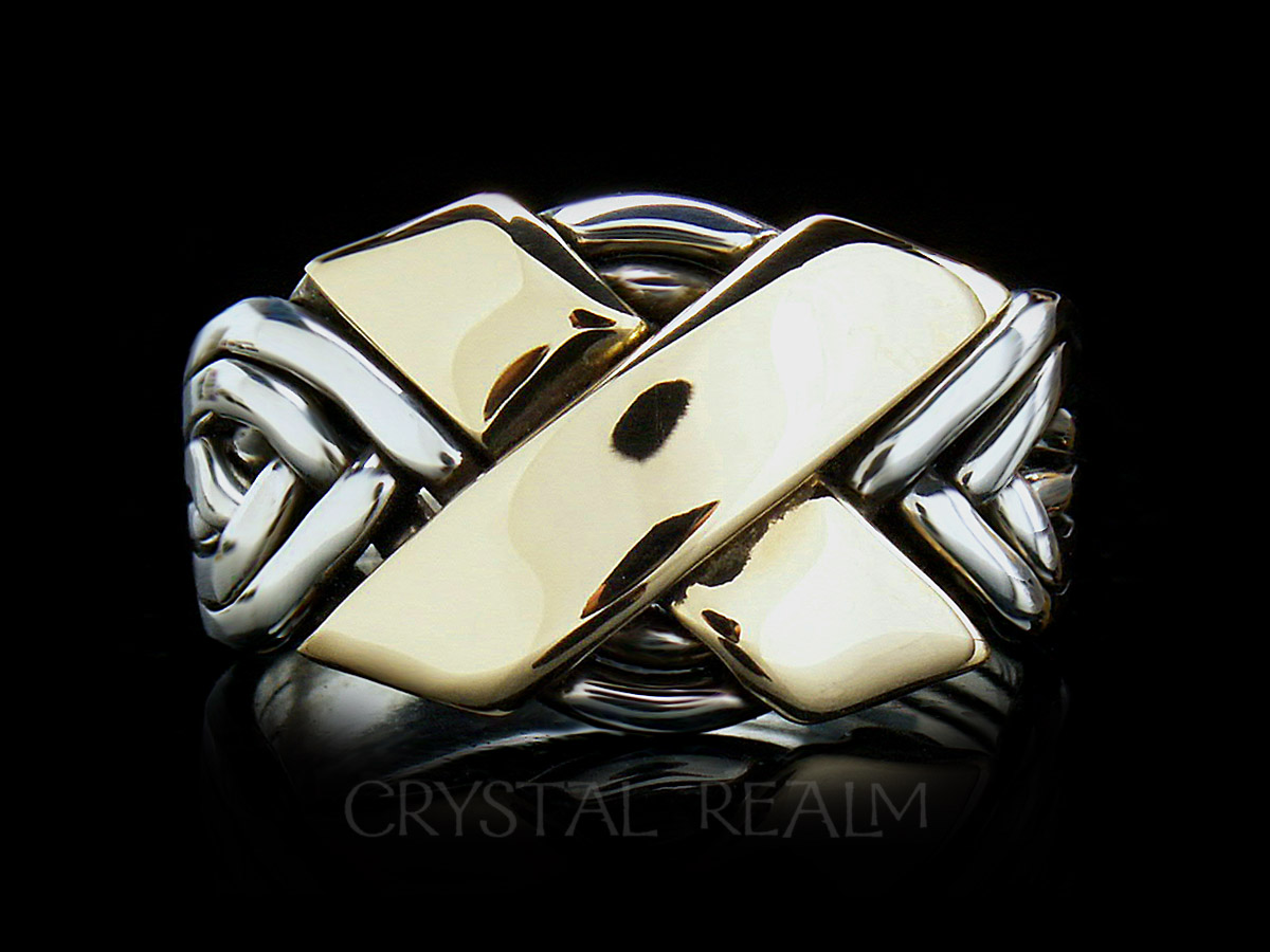 6 piece puzzle ring in sterling silver with two 14k yellow gold bars forming the 'x'