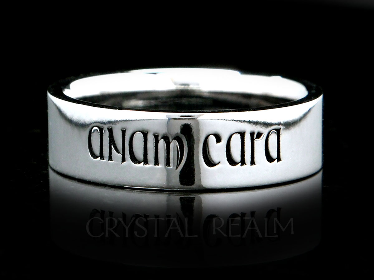 A 14K white gold posy ring is inscribed with the words, 'anam cara," meaning soul friend, in a Gaelic medieval font
