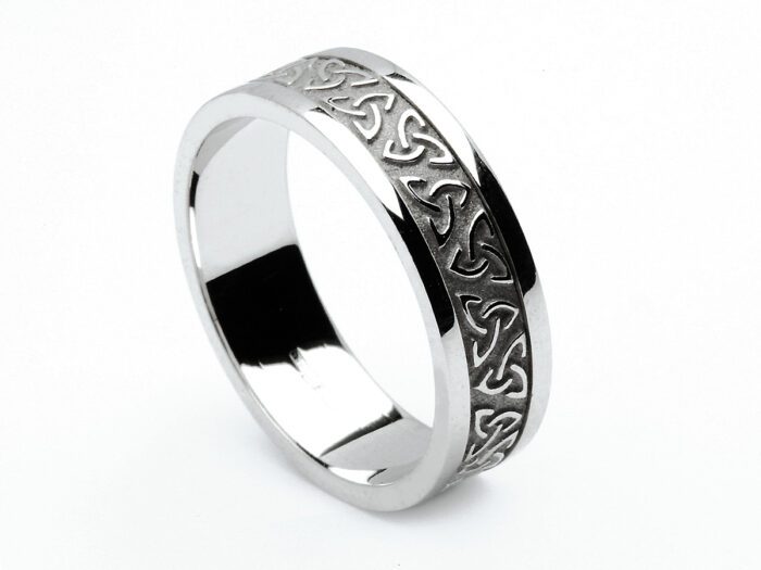 A Celtic trinity knot band in 14K white gold with block trim - a men's or women's wedding band