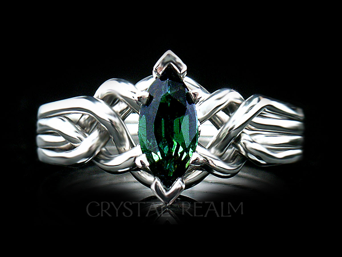 4 piece puzzle engagement ring with marquise tsavorite garnet